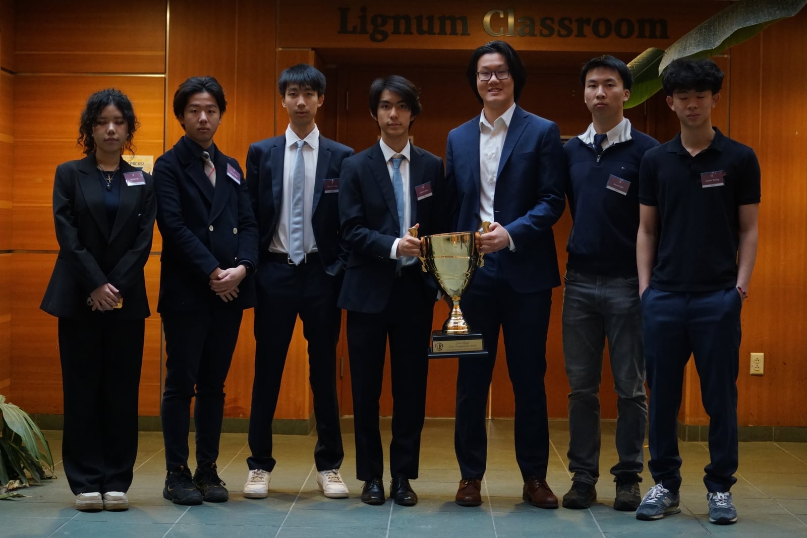 Participants gathered with a trophy after Lord Byng Case Competition