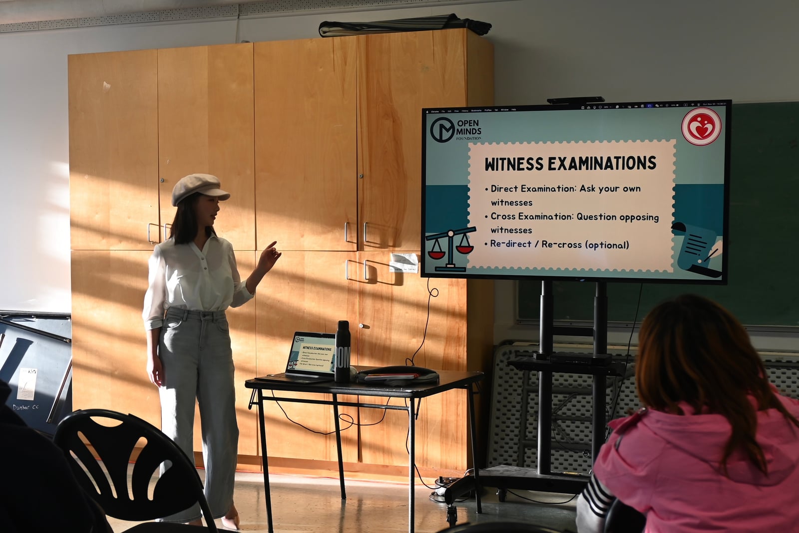 A participant speaking during the Open Arms mock trial workshop