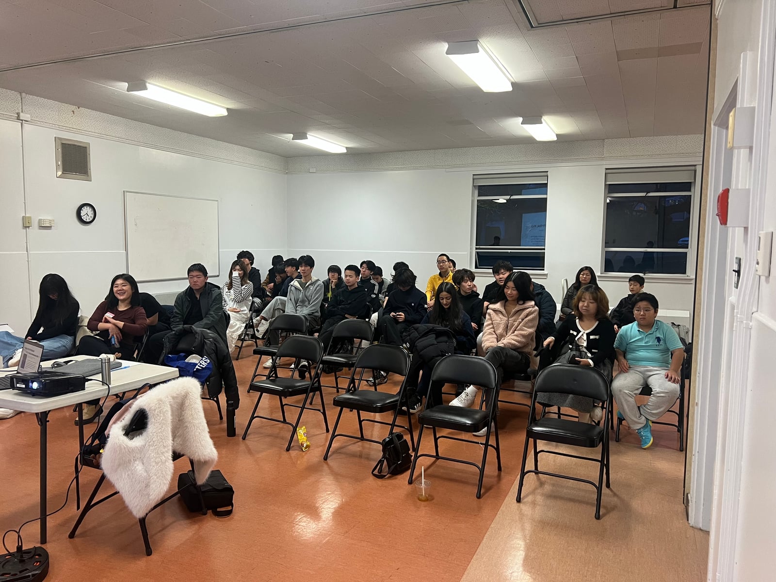 Participants listening during the Striders EDU community event