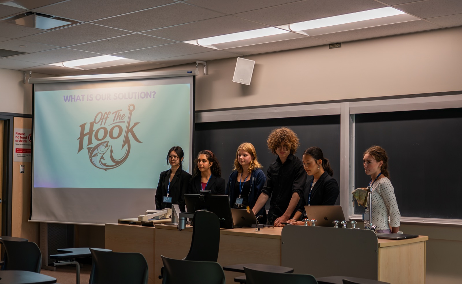 A student team presenting its recommendation at Velocity